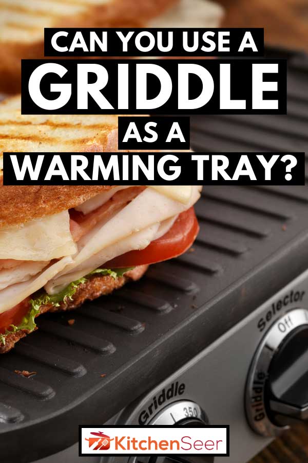 在烤盘上用生菜和西红柿加热火鸡俱乐部帕尼尼，你能用烤盘当加热托盘吗?