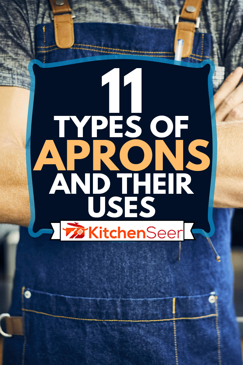 上腹部的自信咖啡师穿智能手表。年轻人站着,双手交叉。服务员穿着围裙在咖啡店,11个类型的围裙和其用途