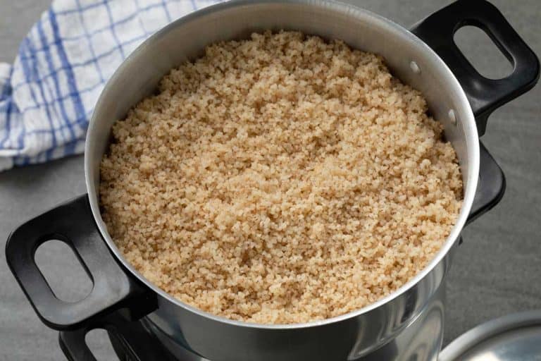 Steamed barley grits, belboula, in a traditional aluminum food steamer, What's The Best Pot For Cooking Grits?