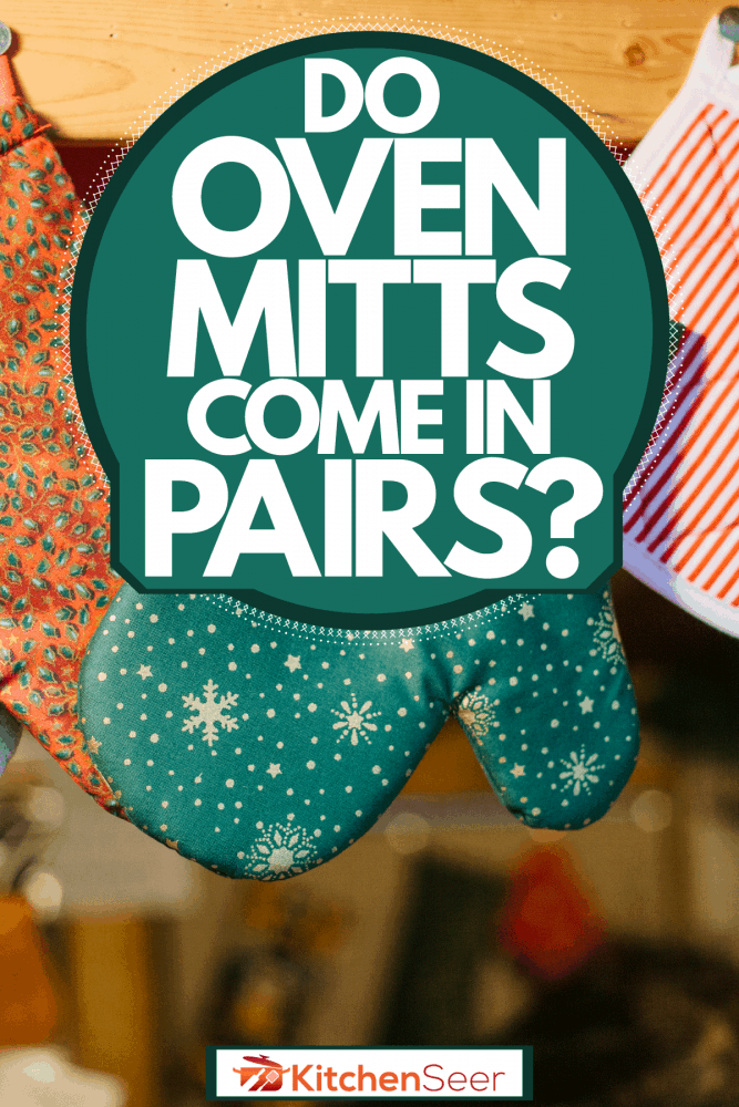 不同颜色和图案的烤箱手套挂在厨房,微波炉手套都是成对的吗?雷电竞官网网址