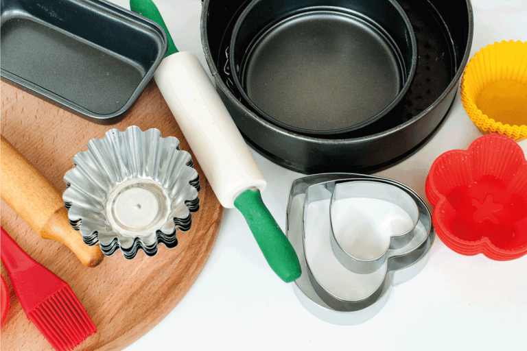 Appliances for baking closeup on wooden background. What To Use Instead Of A Pie Pan [6 Alternatives]