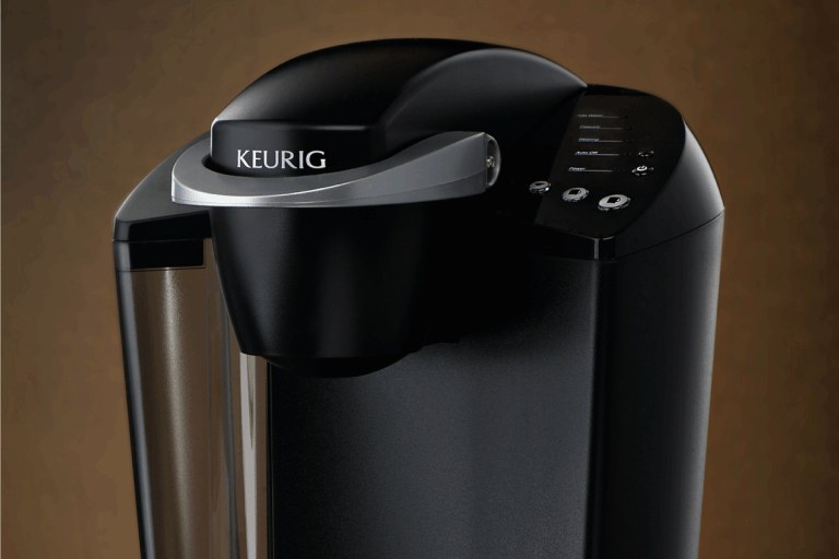Keurig k-cup coffee maker with three k-cup pods. How To Clean A Keurig Needle [With And Without A Tool]