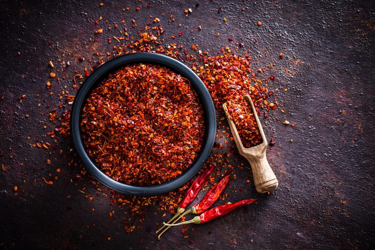 A bowl filled of cayenne pepper, How Long Does Cayenne Pepper Last? [With Tips On Proper Storage!]