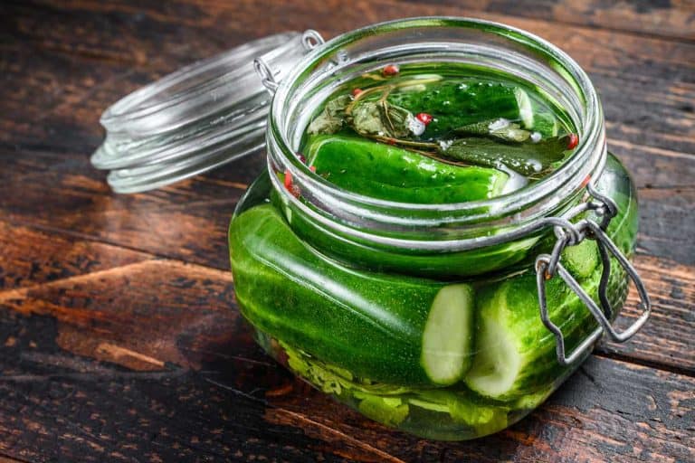 Green salted cucumbers in a glass jar, How To Brine Cucumbers For Pickles In 6 Easy Steps