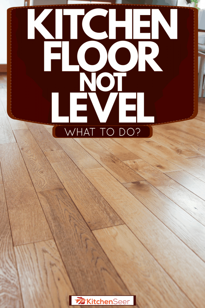 木制厨房地板，白色雷电竞官网网址雷竞技登录椅子和木桌，厨房地板不平整-怎么办?