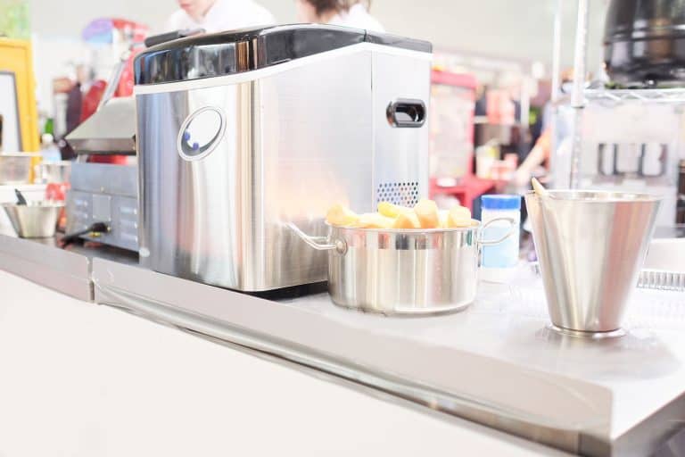 一个制冰机容器夷为平地的表,制冰机杠杆应该向上或向下吗?