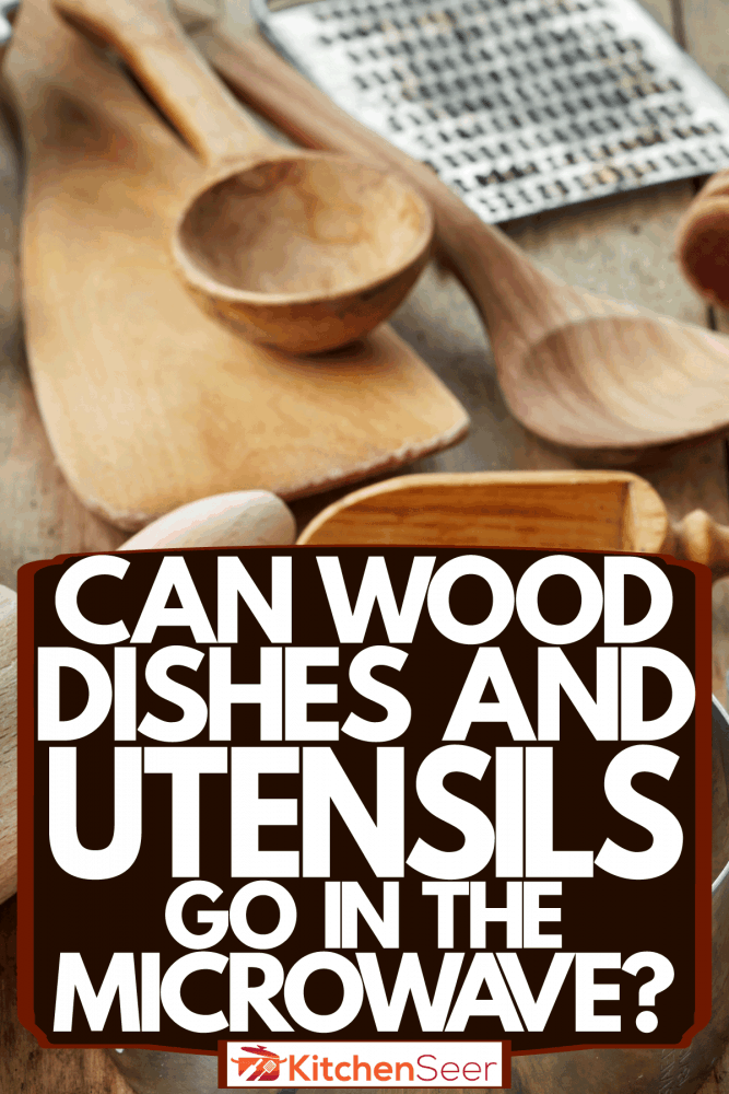 不同种类的木制和不锈钢烘焙用具放在桌上,在微波木盘子和餐具可以吗?