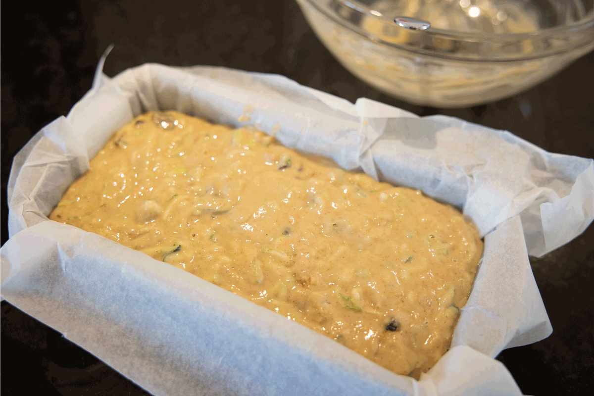 Courgette zucchini loaf cake mixture in a tin (before baking). How To Line A Loaf Pan With Parchment Paper Or Foil