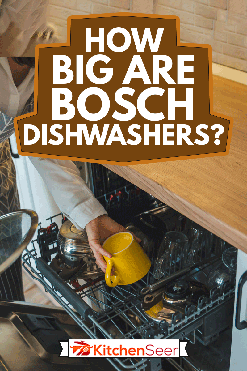 年轻漂亮的女人把盘子放在洗碗机里，博世洗碗机有多大?