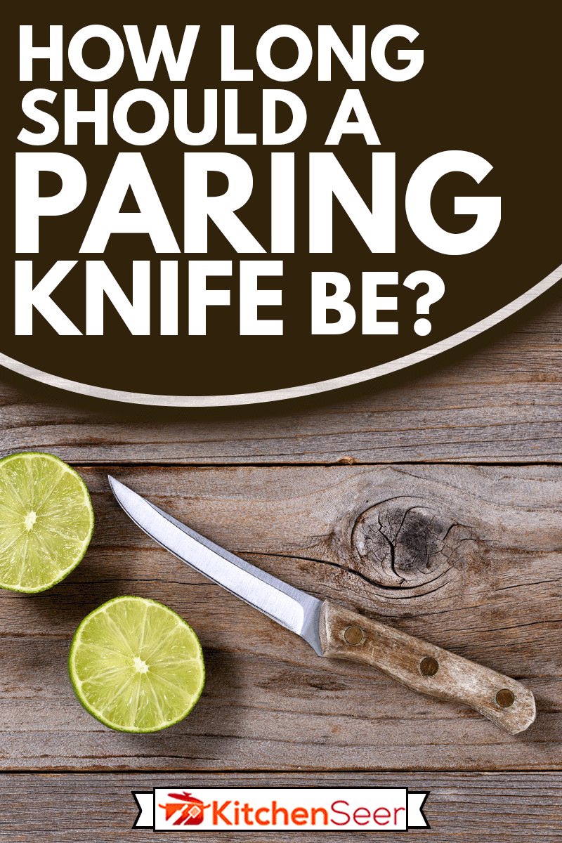 切好的酸橙和削皮刀在质朴的木头上平铺格式，削皮刀应该有多长?