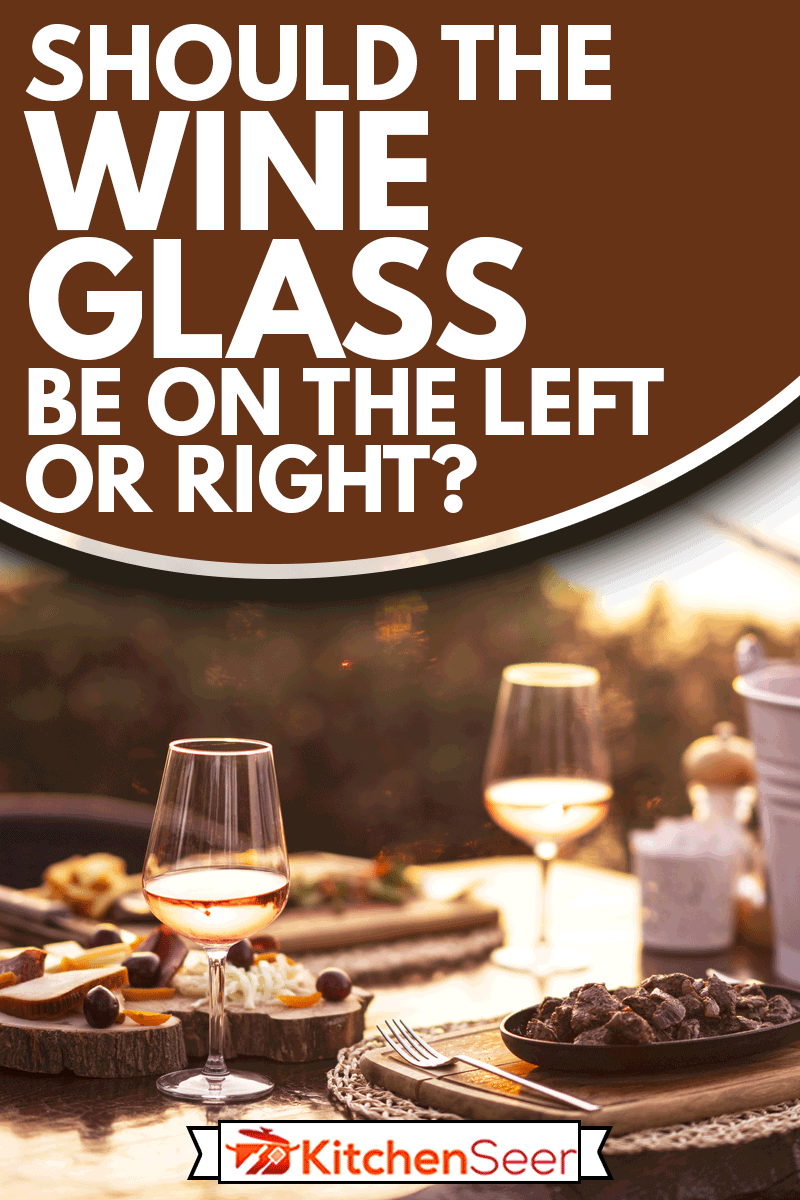 奶酪和葡萄酒盘与玫瑰酒,酒杯应该向左或向右?