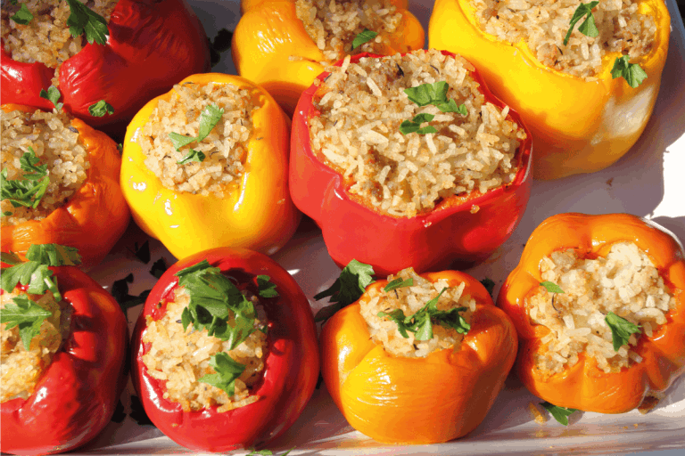 bright-stuffed-peppers-on-a-ceramic-tray.-How-Long-To-Cook-Stuffed-Peppers