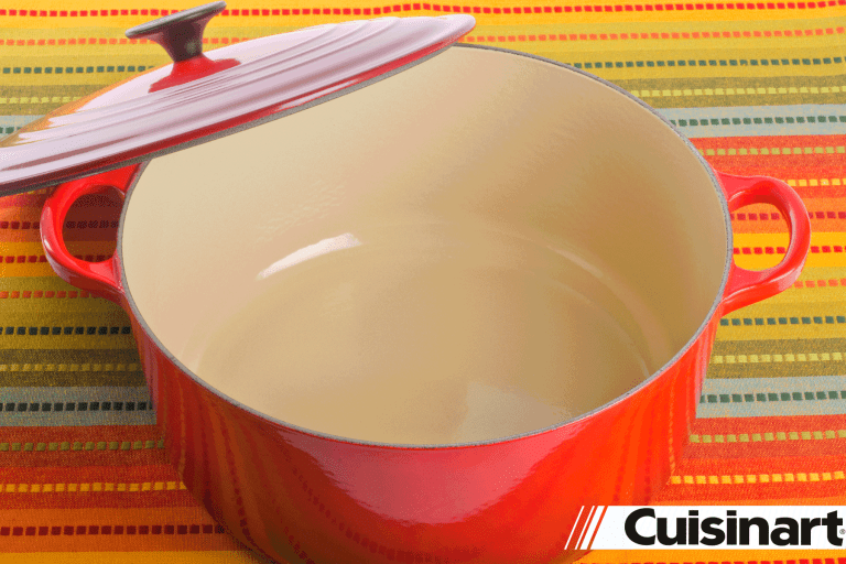一个红色的陶瓷ic Dutch oven pot on the table, Is Cuisinart Dutch Oven Dishwasher-Safe?