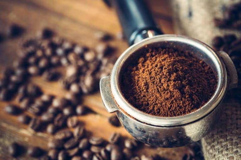 Fresh ground coffee from the coffee grinder, Can You Put Coffee Grounds In The Garbage Disposal?