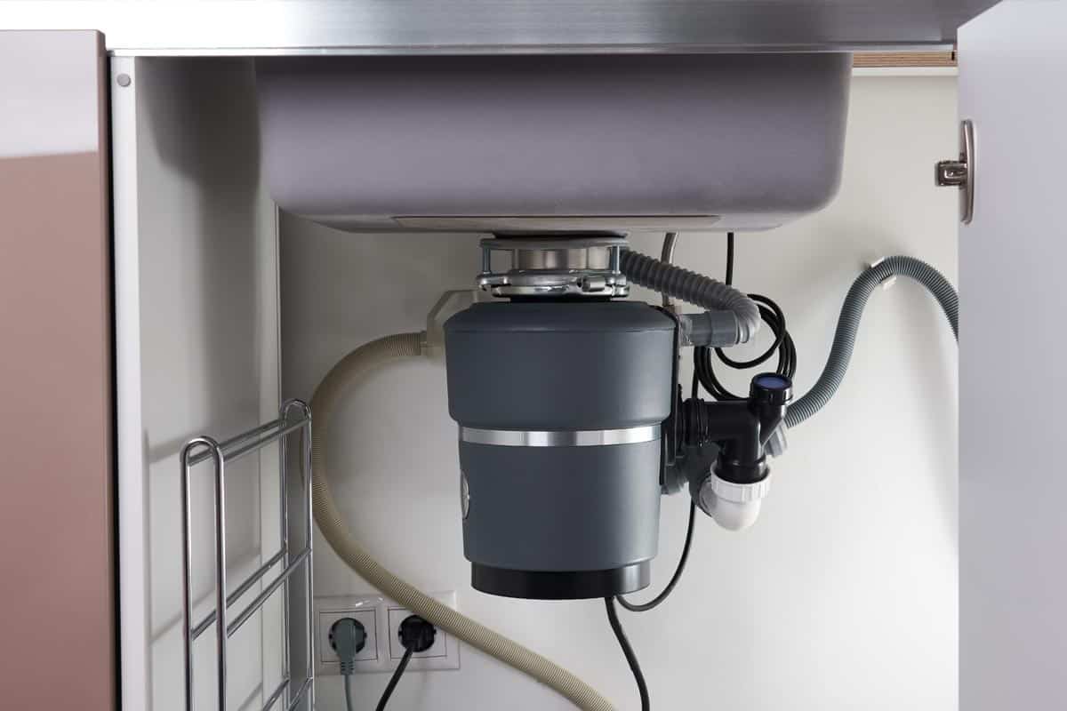 垃圾处理在现代沉下,垃圾处理和垃圾压缩机:选择哪一个?