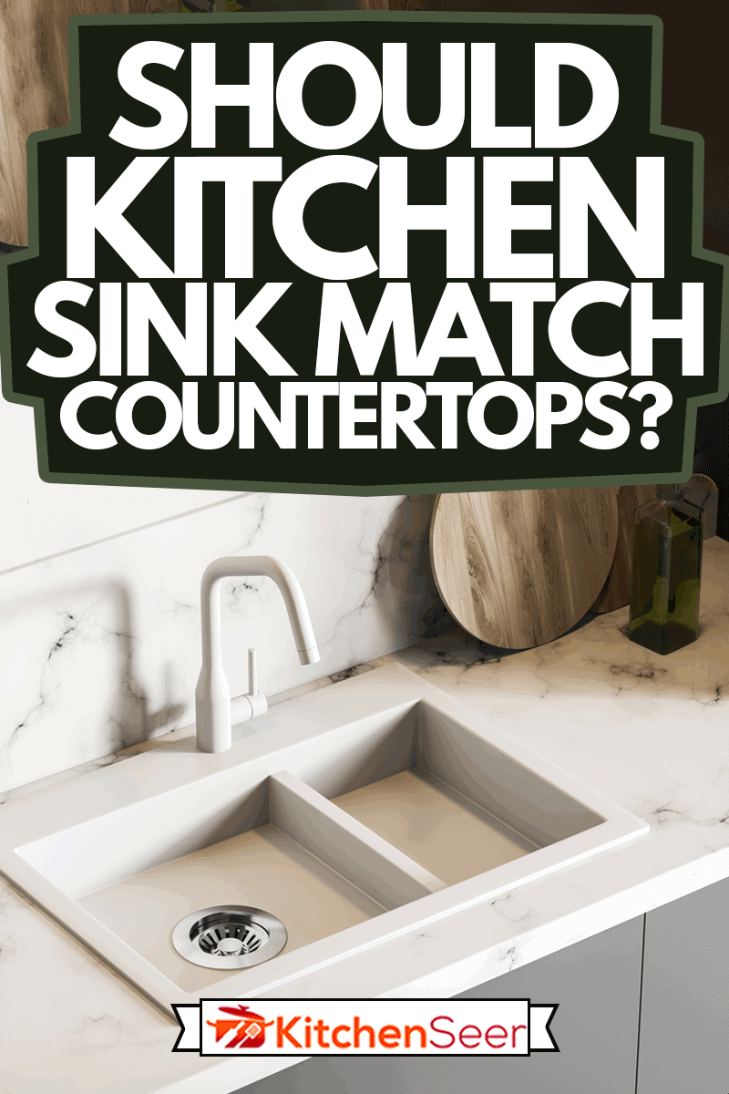 顶视图的白色大理石厨房水槽站在灰色工作台面与白墙房雷电竞官网网址间,厨房水槽与台面吗?雷竞技官网rb