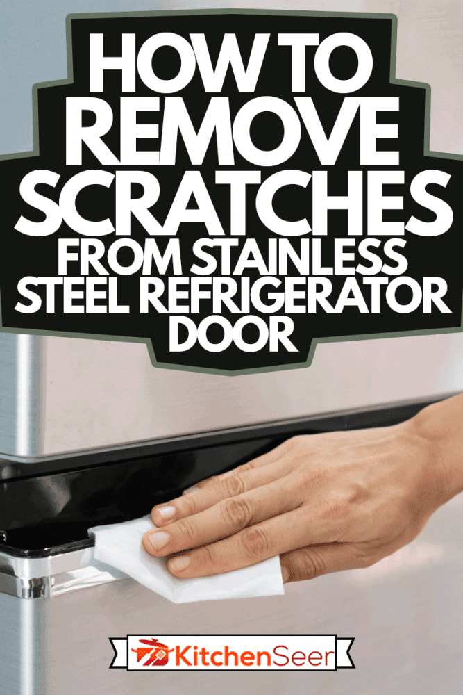 年轻的亚洲妇女在家里用湿纸巾清洁不锈钢冰箱的手，如何去除不锈钢冰箱门上的划痕