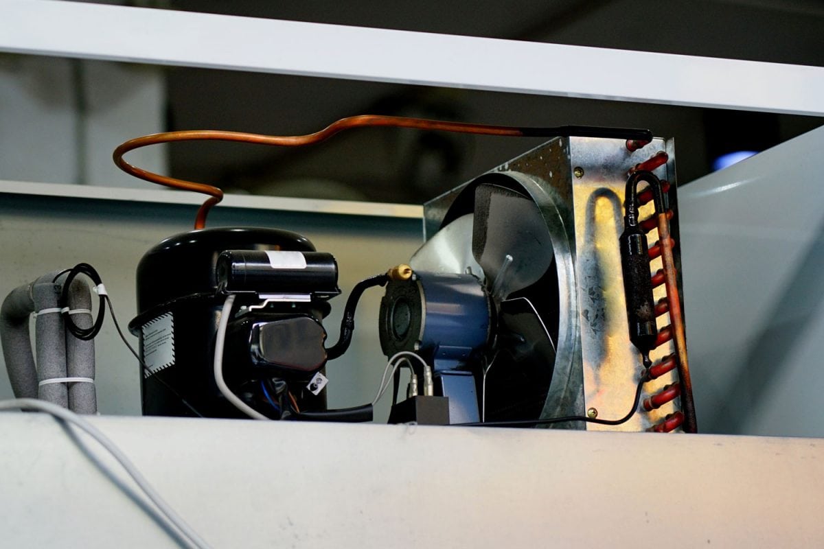 拆卸冰箱压缩机