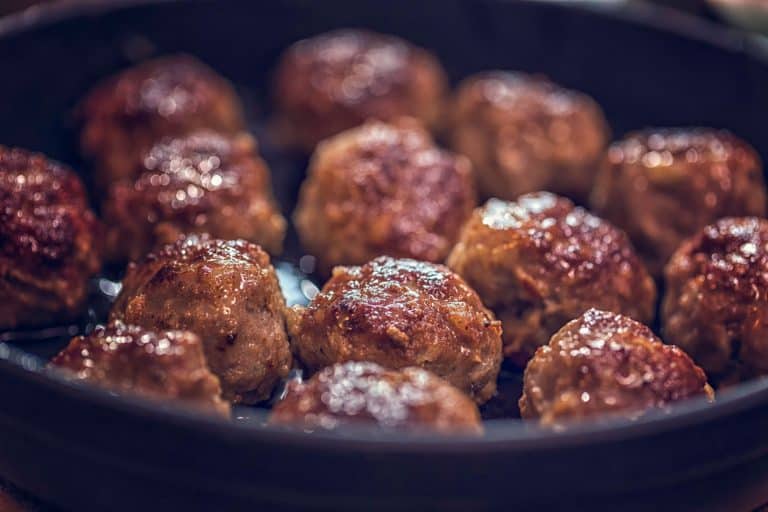 Frying delicious meatballs on the skillet, How Long To Cook Meatballs