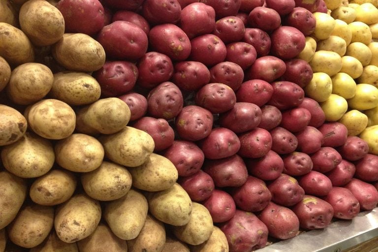 A big pile of potatoes at a market, What Potatoes Are Best For Baking?