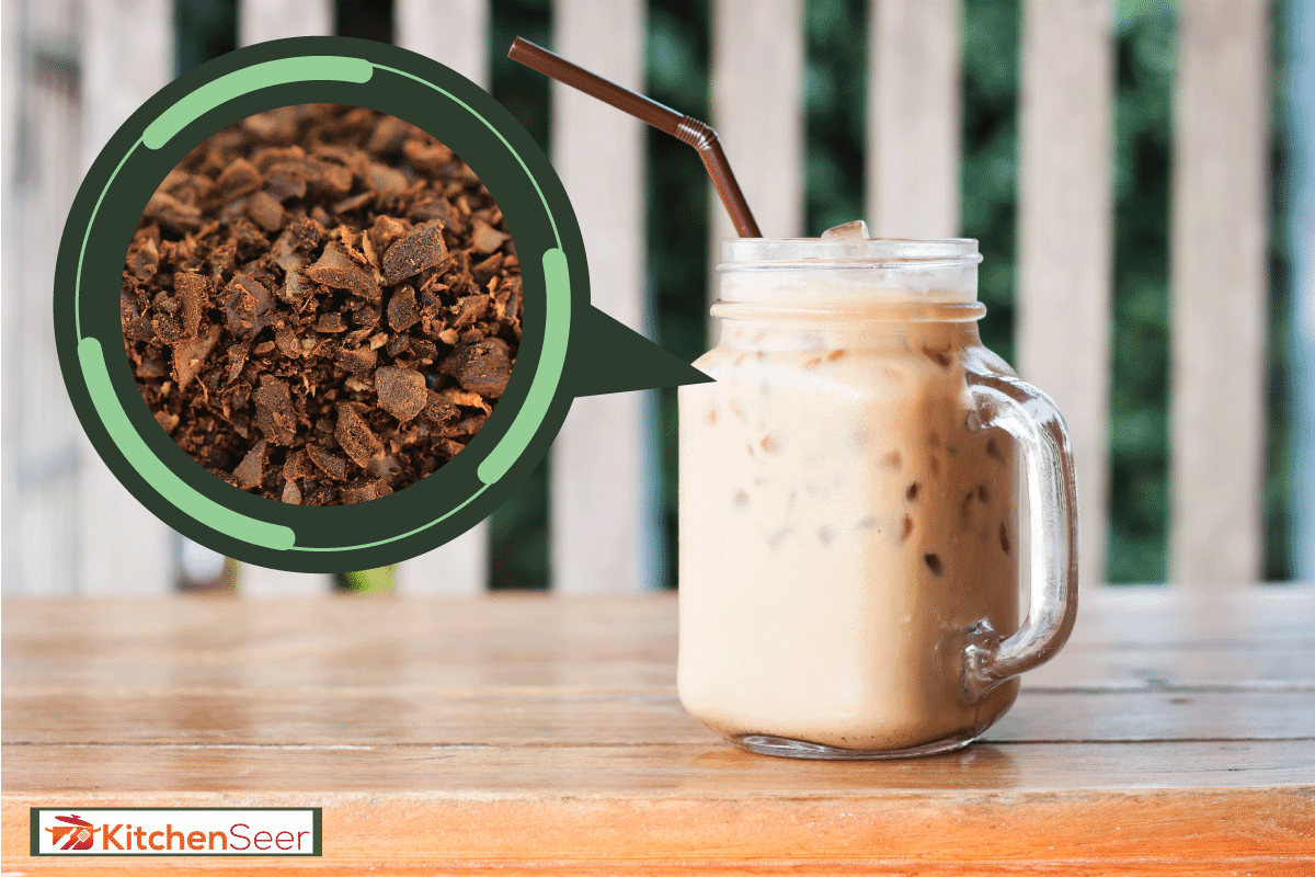 Glass of iced coffee on wooden table, How To Grind Coffee Beans For Iced Coffee