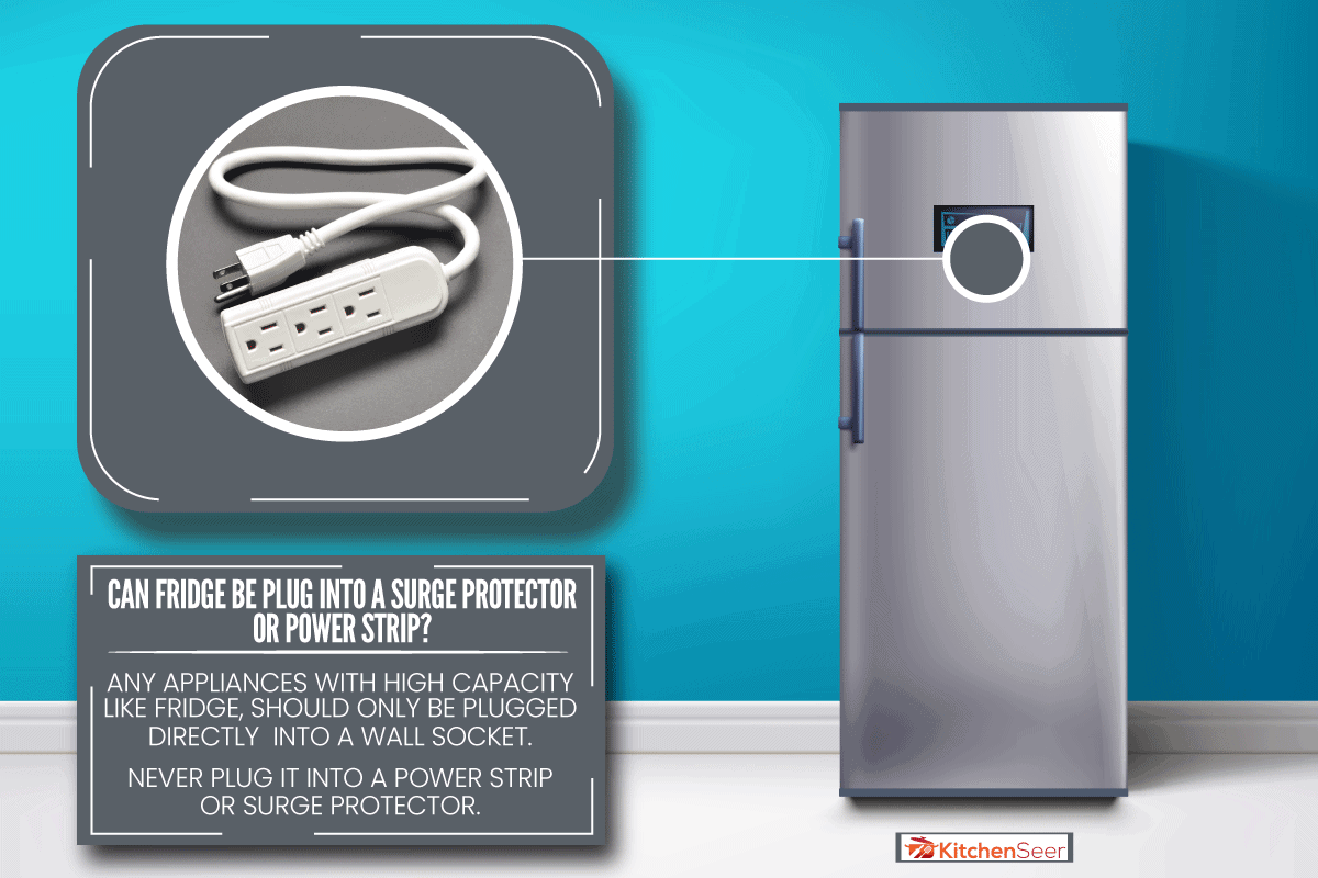 冰箱在一个浅蓝色的墙,你能冰箱插入浪涌保护器或电源板吗?