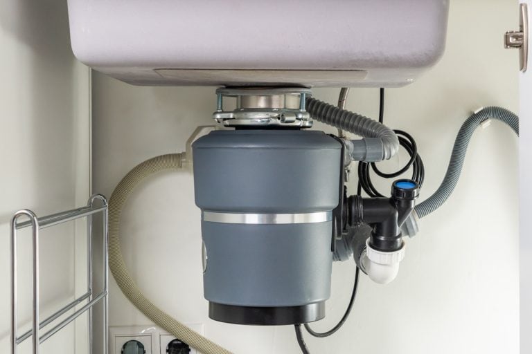 Garbage disposal under the sink, Garbage Disposal Not Draining—What To Do?