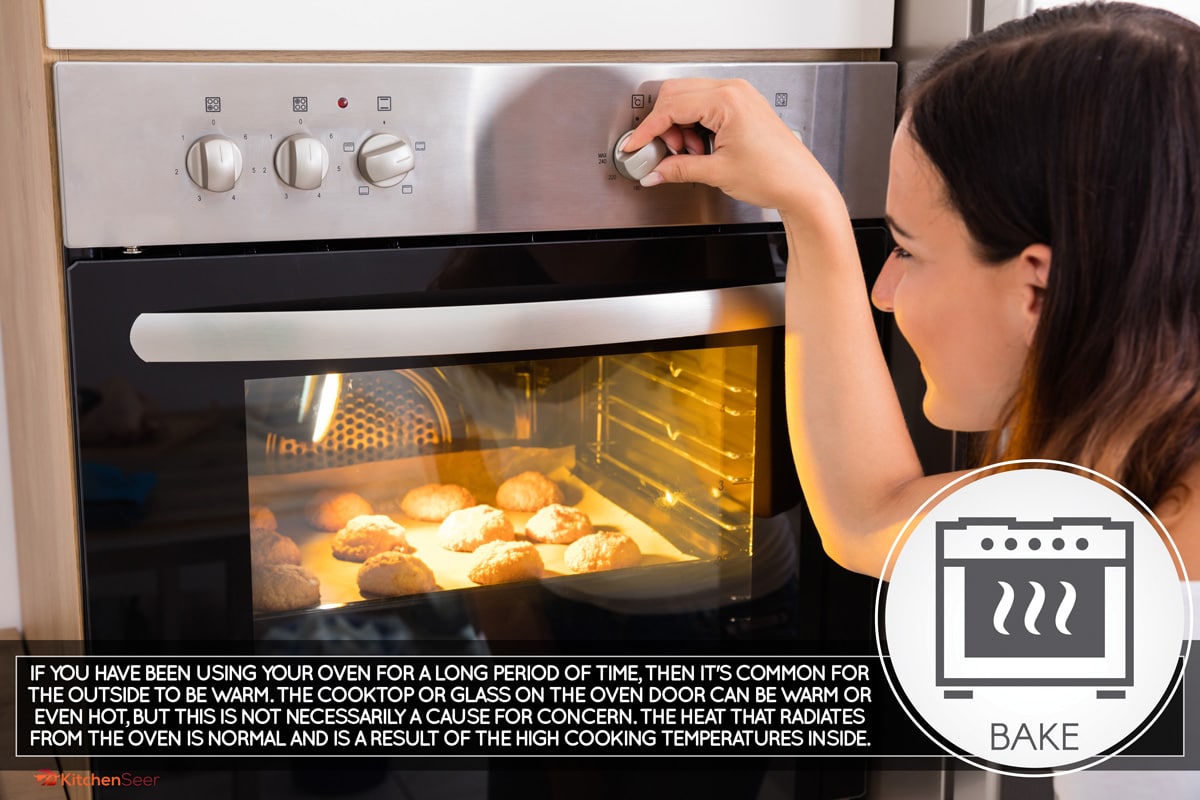 Young Woman Using Microwave Oven For Baking Fresh Cookies In Kitchen, Should Ovens Get Hot On The Outside?