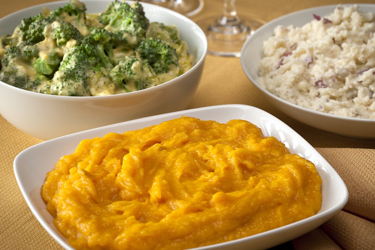 Side dishes on a CorningWare bowl