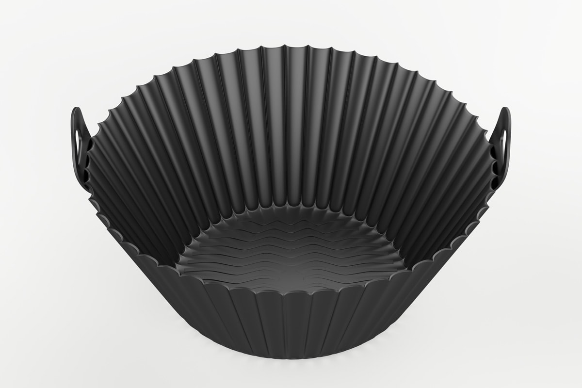 可重用的空气炸锅硅胶衬垫孤立在白色背景。